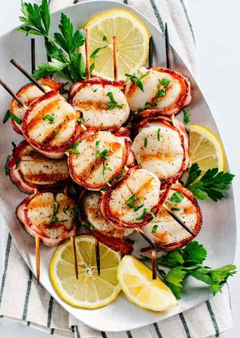 How do you know when scallops are done on the grill?